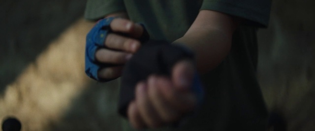 Video Reference: Gesture, Finger, Thumb, Wrist, Electric blue, Sign language, Nail, Sleeve, Font, Human leg