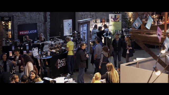 Video Reference: Automotive design, Suit, Event, City, Crowd, Entertainment, T-shirt, Audio equipment, Font, Conversation