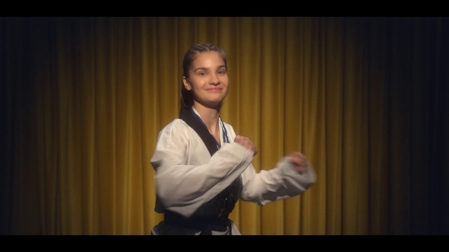 Video Reference: Sleeve, Theater curtain, Gesture, Smile, Curtain, Performing arts, Event, Entertainment, Uniform, Collar