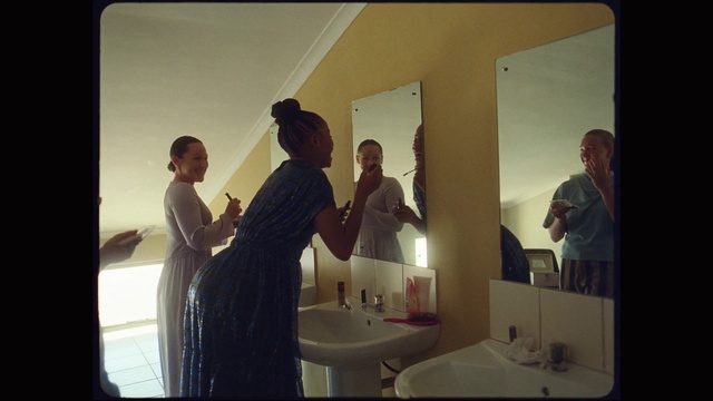 Video Reference: Mirror, Sink, Bathroom, Plumbing fixture, Bathroom sink, Lighting, Flash photography, Gesture, Tap, Event