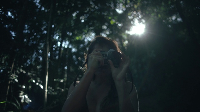 Video Reference: Hand, Flash photography, Branch, Organism, Vision care, Tree, Grass, People in nature, Lens flare, Midnight