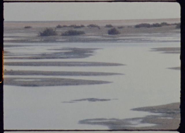 Video Reference: Picture frame, Rectangle, Body of water, Snow, Atmospheric phenomenon, Landscape, Art, Plain, Tints and shades, Calm