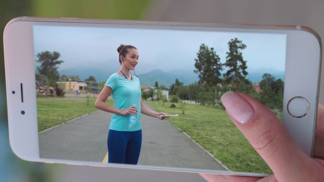 Video Reference: Plant, Tree, Gesture, Grass, Sky, Fun, Leisure, Technology, Waist, Electronic device