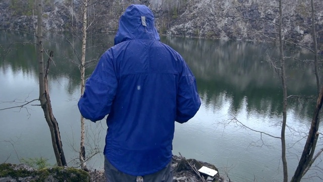 Video Reference: Water, Plant, Outerwear, Vertebrate, Sleeve, Lake, Tree, Watercourse, Jacket, Bank