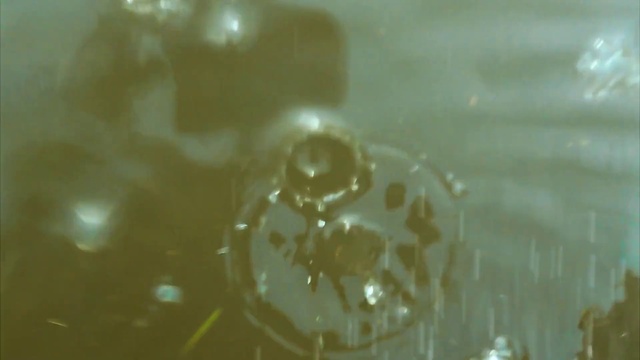 Video Reference: Liquid, Amber, Fluid, Transparent material, Circle, Macro photography, Fashion accessory, Glass, Pattern, Science