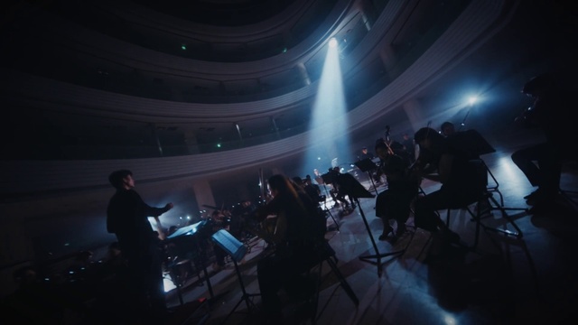 Video Reference: Musical instrument accessory, Musician, Chair, Performing arts, Music, Entertainment, Music artist, Music venue, Event, Performance art