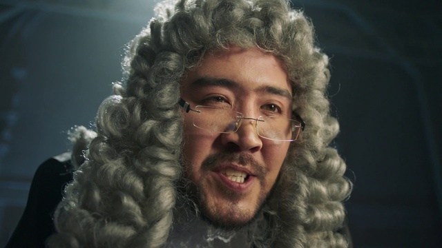 Video Reference: Forehead, Nose, Chin, Glasses, Eyebrow, Facial expression, Vertebrate, Beard, Ear, Flash photography