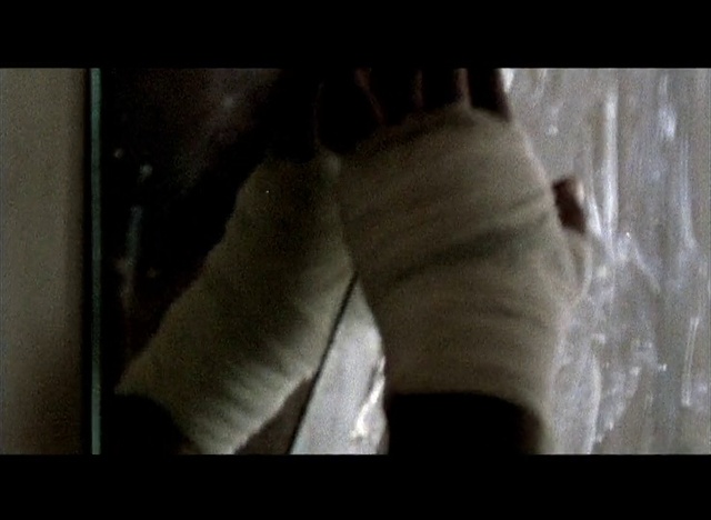 Video Reference: Flash photography, Gesture, Tints and shades, Human leg, Wrist, Knee, Font, Monochrome photography, Darkness, Foot