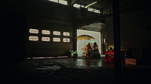 Video Reference: Chair, Entertainment, Performing arts, Tints and shades, Event, Darkness, Performance art, Flooring, Stage, Music venue