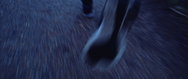 Video Reference: Grey, Automotive tire, Flooring, Wood, Asphalt, Electric blue, Sportswear, Synthetic rubber, Rim, Human leg