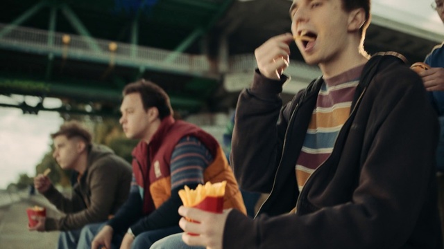 Video Reference: Hand, Outerwear, Gesture, Jacket, Fun, Event, Recreation, Tableware, Crowd, Conversation