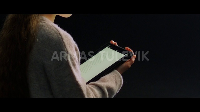 Video Reference: Sleeve, Gadget, Font, Book, Wrist, Recreation, Darkness, Display device, Nail, Office supplies