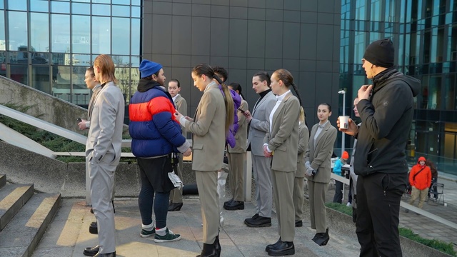 Video Reference: Footwear, Security, Bag, Event, Luggage and bags, Uniform, Suit, City, White-collar worker, Hat