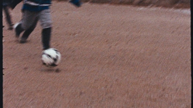 Video Reference: Sports equipment, Soccer, Ball, Football, Wood, Player, Soccer ball, Ball game, Flooring, Sports