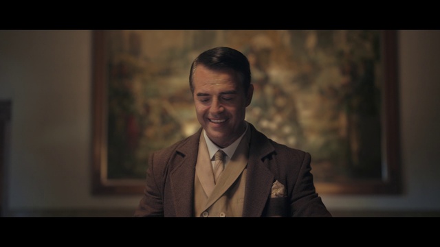 Video Reference: Smile, Flash photography, Coat, Happy, Suit, Collar, Blazer, Formal wear, Event, White-collar worker