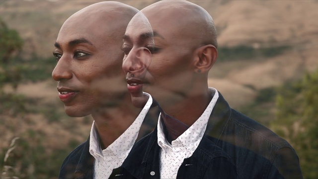 Video Reference: Forehead, Head, Lip, Chin, Outerwear, Neck, Happy, Gesture, Eyewear, Headgear