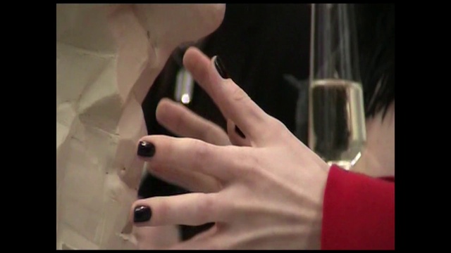 Video Reference: Gesture, Finger, Tableware, Drinkware, Thumb, Nail, Communication Device, Wrist, Barware, Formal wear