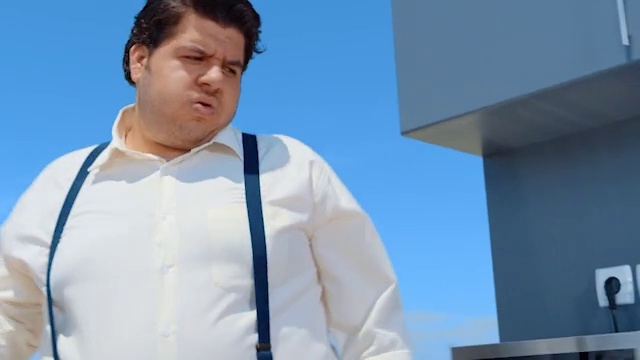 Video Reference: Outerwear, Sky, Dress shirt, Azure, Neck, Sleeve, Gesture, Collar, Blazer, White-collar worker