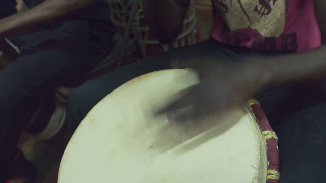 Video Reference: Membranophone, Jaw, Drum, Elbow, Musical instrument, Wrist, Waist, Eyewear, Trunk, Human leg