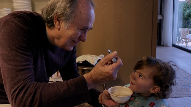 Video Reference: Mouth, Tableware, Gesture, Food craving, Sharing, Smile, Toddler, Event, Food, Child