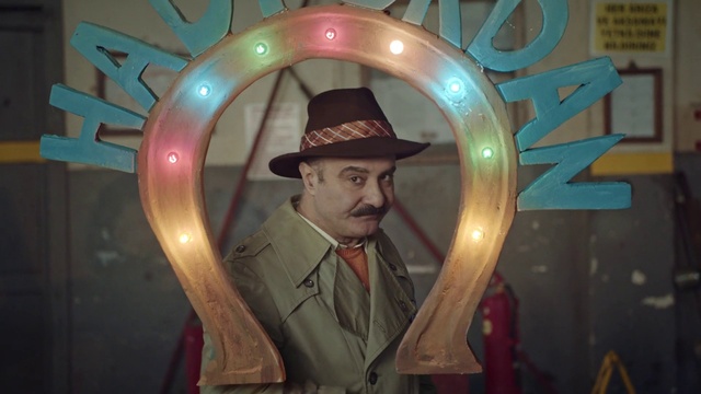 Video Reference: Hat, Sun hat, Human, Fedora, Picture frame, Headgear, Fun, Suit, Costume hat, Blazer