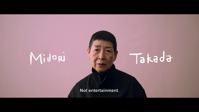 Video Reference: Forehead, Sleeve, Flash photography, Font, Magenta, Happy, Event, Brand, Formal wear, Multimedia