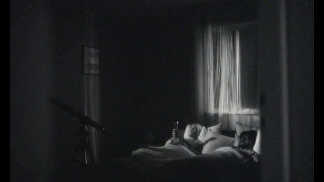 Video Reference: Flash photography, Comfort, Grey, Building, Tints and shades, Pillow, Curtain, Monochrome photography, Event, Monochrome