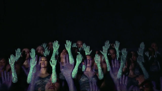 Video Reference: Purple, Human body, Entertainment, Gesture, Flash photography, Performing arts, Finger, Leisure, Font, Stage