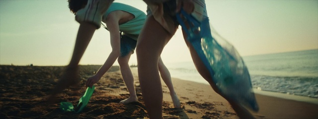 Video Reference: People on beach, Leg, People in nature, Shorts, Beach, Gesture, Thigh, Sunlight, Barefoot, Happy