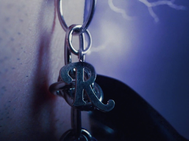 Video Reference: Azure, Gas, Font, Cloud, Tints and shades, Jewellery, Electric blue, Metal, Symbol, Keychain