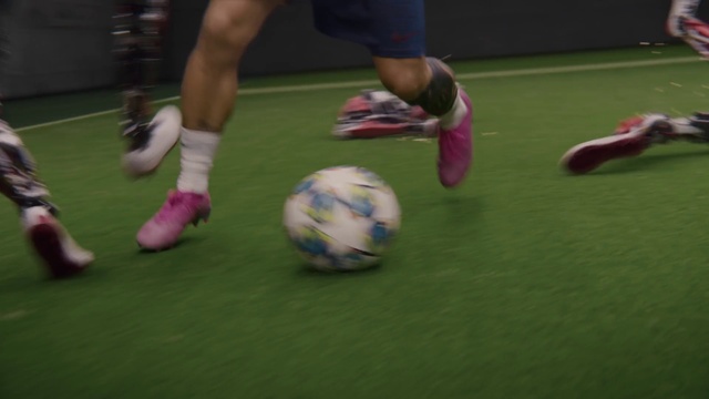 Video Reference: Sports uniform, Sports equipment, Shorts, Football, Sports gear, Ball, Football equipment, Soccer ball, Knee, Grass