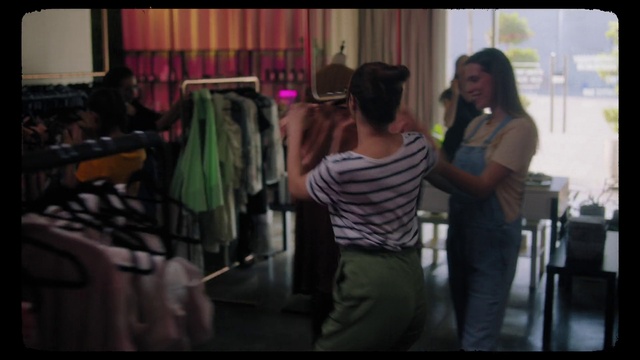 Video Reference: Flash photography, Gesture, Fashion design, T-shirt, Fun, Event, Art, Magenta, Visual arts, Room