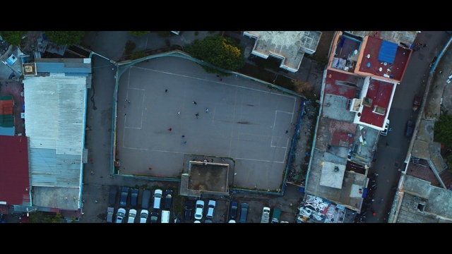 Video Reference: Urban design, Gadget, Rectangle, Space, Display device, Glass, Font, Multimedia, Windshield, Auto part