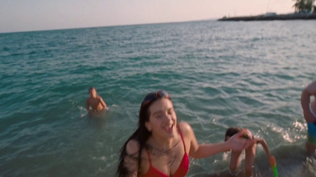 Video Reference: Water, Sky, Muscle, Swimwear, Brassiere, Travel, Smile, Leisure, Happy, Recreation