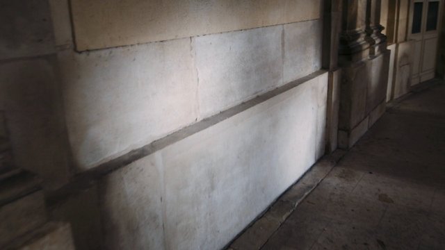 Video Reference: corridor, hallway, wall, stone, concrete, architecture, interior, columns, tiled floor, empty, dim light, urban, texture, perspective