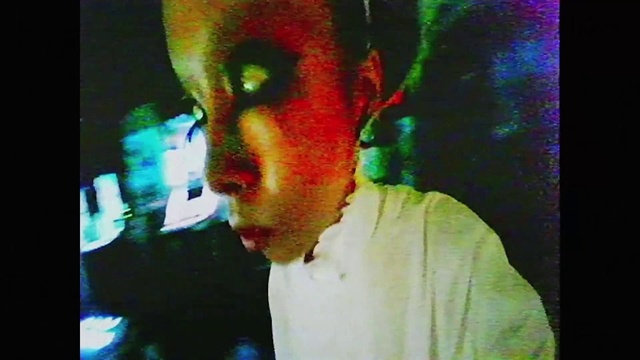 Video Reference: Artist, Eyelash, Art, T-shirt, Visual arts, Flash photography, Darkness, Fun, Magenta, Flesh