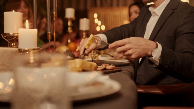 Video Reference: Tableware, Candle, Gesture, Candle holder, Plate, Wax, Suit, Dishware, Event, Stemware