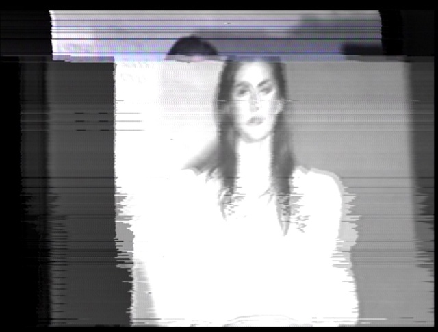 Video Reference: Flash photography, Tints and shades, Display device, Art, Television set, Font, Rectangle, Symmetry, Electric blue, Darkness