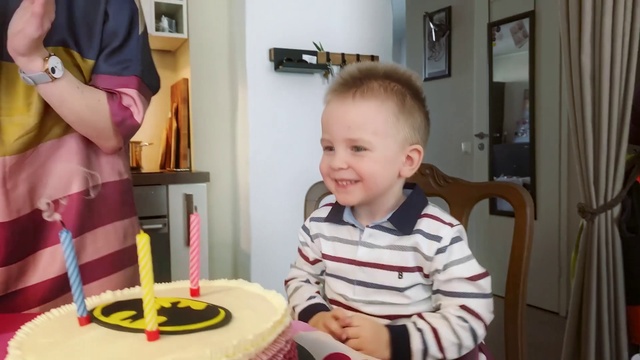 Video Reference: Smile, Birthday candle, Candle, Birthday party, Fun, T-shirt, Cake, Toddler, Cake decorating, Chair