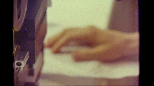 Video Reference: Hand, Gesture, Finger, Thumb, Wood, Tints and shades, Wrist, Nail, Human leg, Font