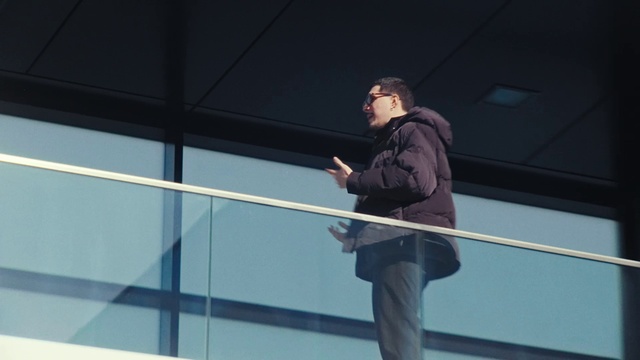 Video Reference: Electric blue, City, Sky, Sleeve, Glass, Symmetry, Building