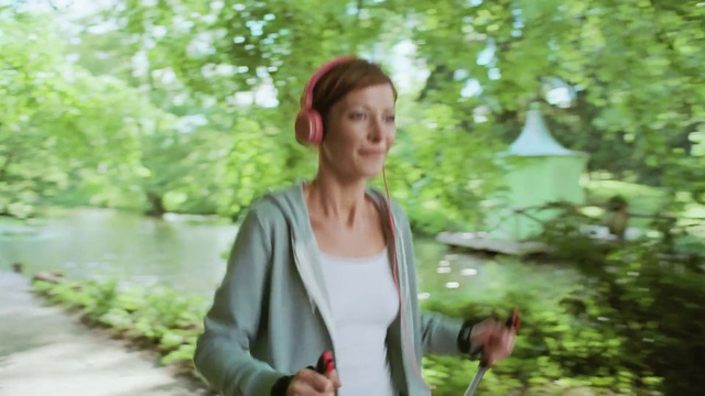 Video Reference: Plant, Facial expression, Smile, Leaf, People in nature, Neck, Sleeve, Happy, Grass, Street fashion