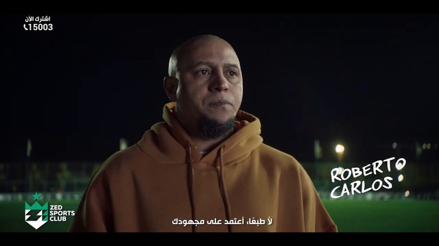 Video Reference: Flash photography, Sleeve, Midnight, Font, Event, Darkness, Facial hair, Photo caption, Hoodie, Night