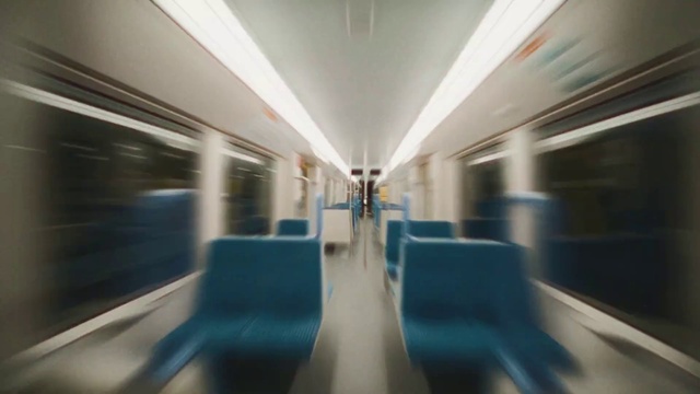 Video Reference: Train, Air travel, Vehicle, Rolling stock, Passenger, Public transport, City, Tints and shades, Passenger car, Symmetry