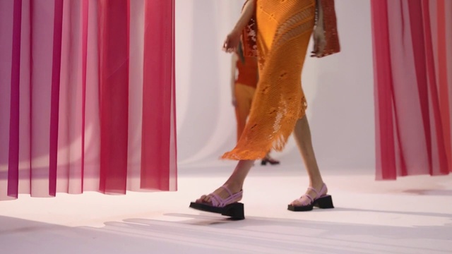 Video Reference: Dress, Sleeve, Waist, Fashion design, Performing arts, Thigh, Entertainment, Curtain, High heels, Formal wear