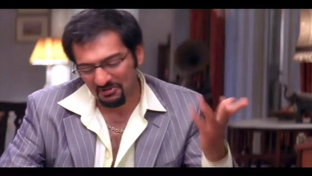 Video Reference: Forehead, Glasses, Vision care, Beard, Jaw, Flash photography, Gesture, Eyewear, Dress shirt, Event