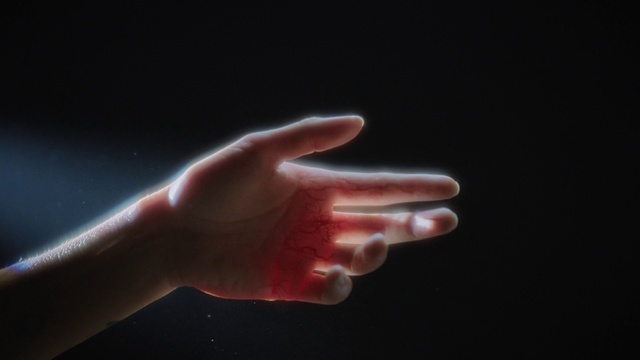 Video Reference: Gesture, Thumb, Nail, Electric blue, Wrist, Gas, Darkness, Sign language, Event, Flesh