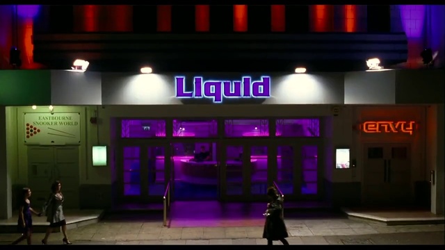 Video Reference: Purple, Violet, Pink, Font, Entertainment, Magenta, Display device, Electronic signage, Facade, Building