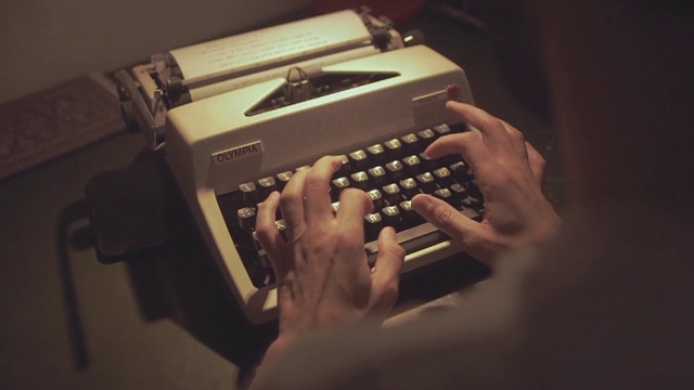 Video Reference: Typewriter, Office supplies, Office equipment, Flash photography, Machine, Nail, Space bar, Event, Darkness, Wrist