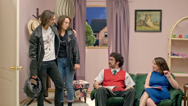 Video Reference: Joint, Photograph, Fashion, Curtain, Yellow, Interior design, Style, Interaction, Picture frame, Thigh